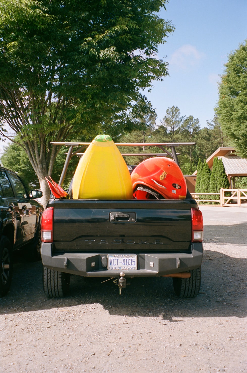 A truck carries rafting gear.