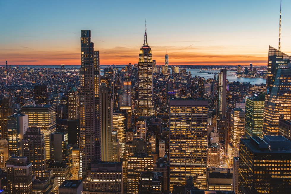 New york city skyline at dusk with illuminated buildings