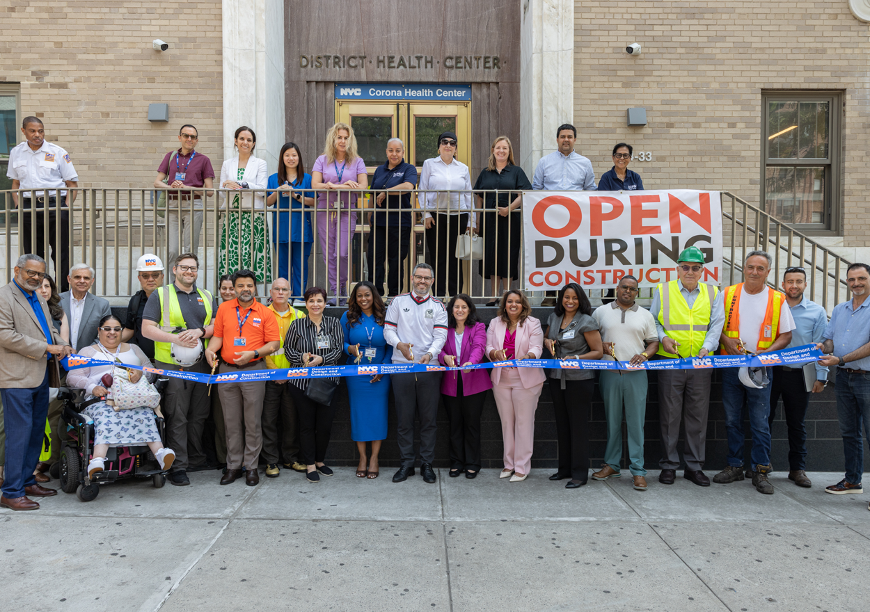 group photo at ribbon cutting event