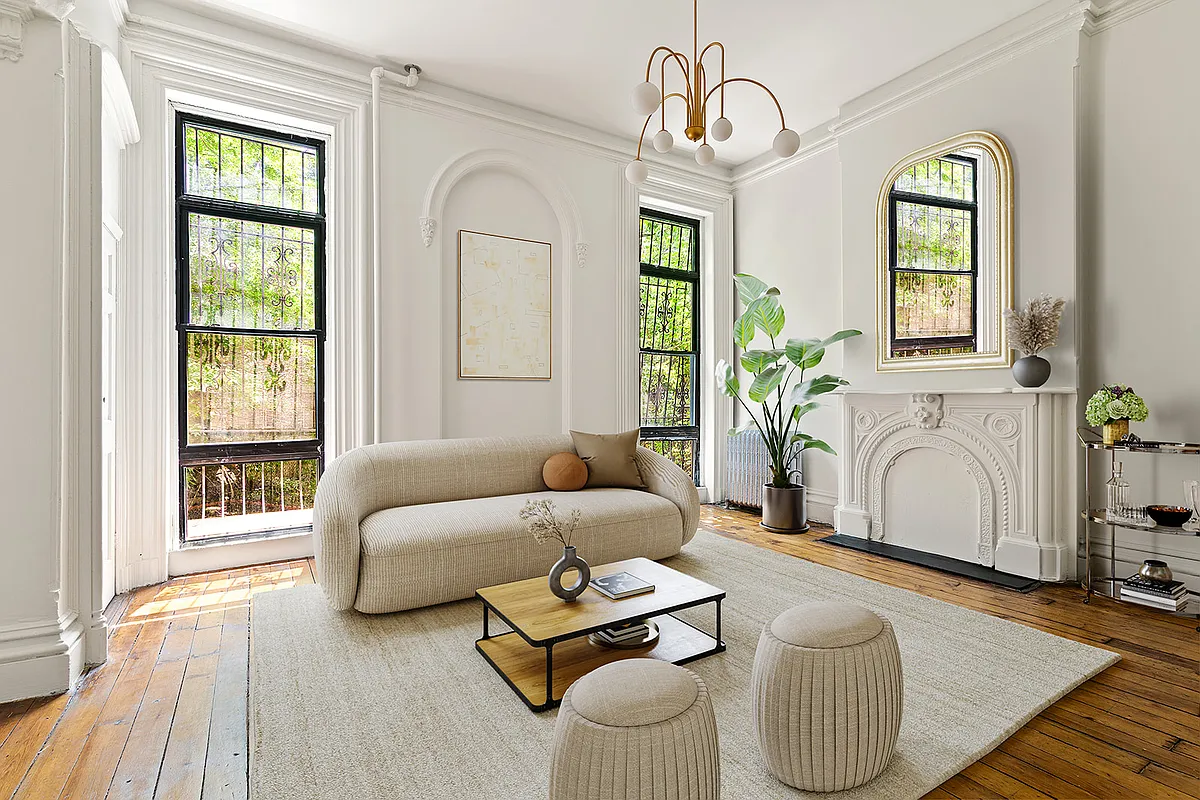 parlor with white walls, mantel