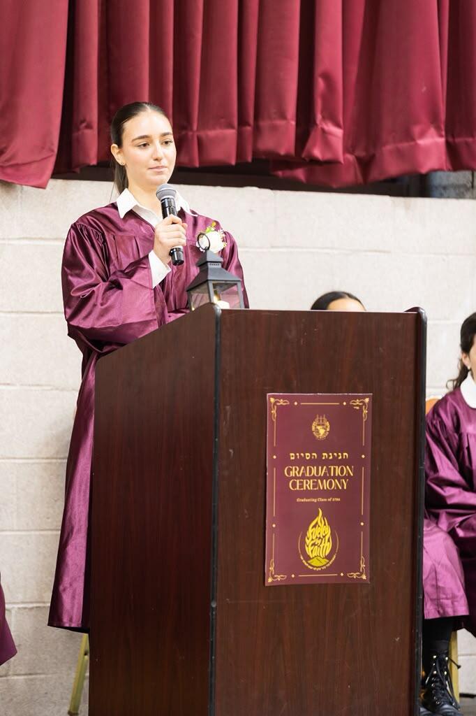 A Beth Rivkah High School graduate addresses classmates during the school's graduation ceremony in Brooklyn, New York (Photo: Yossi Kahane/Beth Rivkah) A Beth Rivkah High School graduate addresses classmates during the school's graduation ceremony in Brooklyn, New York