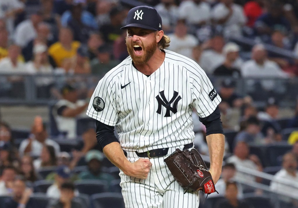 New York Yankees pitcher Paul Blackburn reacting after getting out of the seventh inning with men on base.