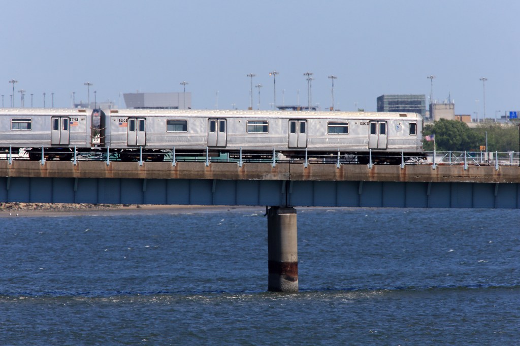 Girl, 16, hospitalized with serious injuries after striking beam while subway surfing on A train in Queens