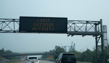 Smoke in the air keeps many indoors, but some still outside