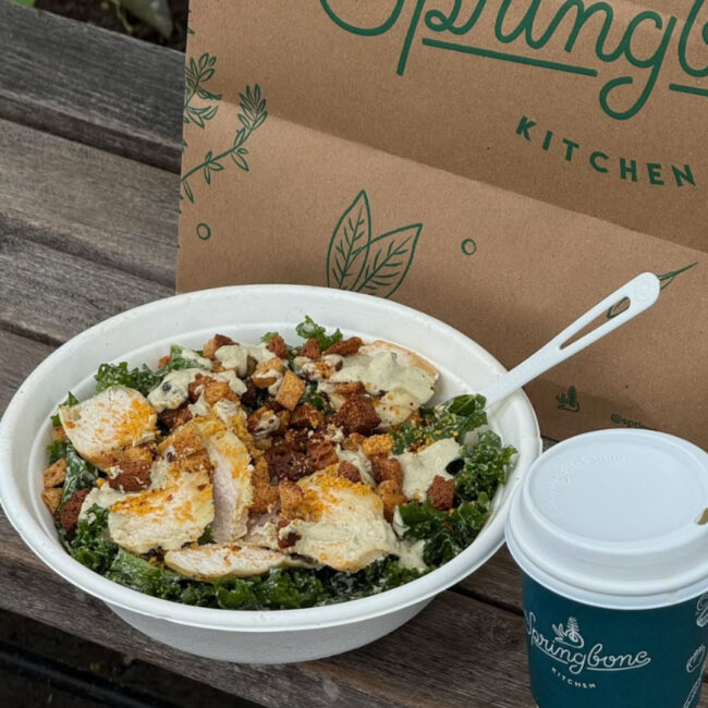 an image of a salad bowl and cup of bone broth from springbone kitchen