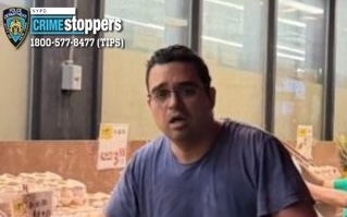 Cops are looking for the suspect who rode up next to a young boys and assaulted him near a Flushing supermarket on Main Street in an unprovoked attack.