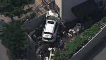 suv into house