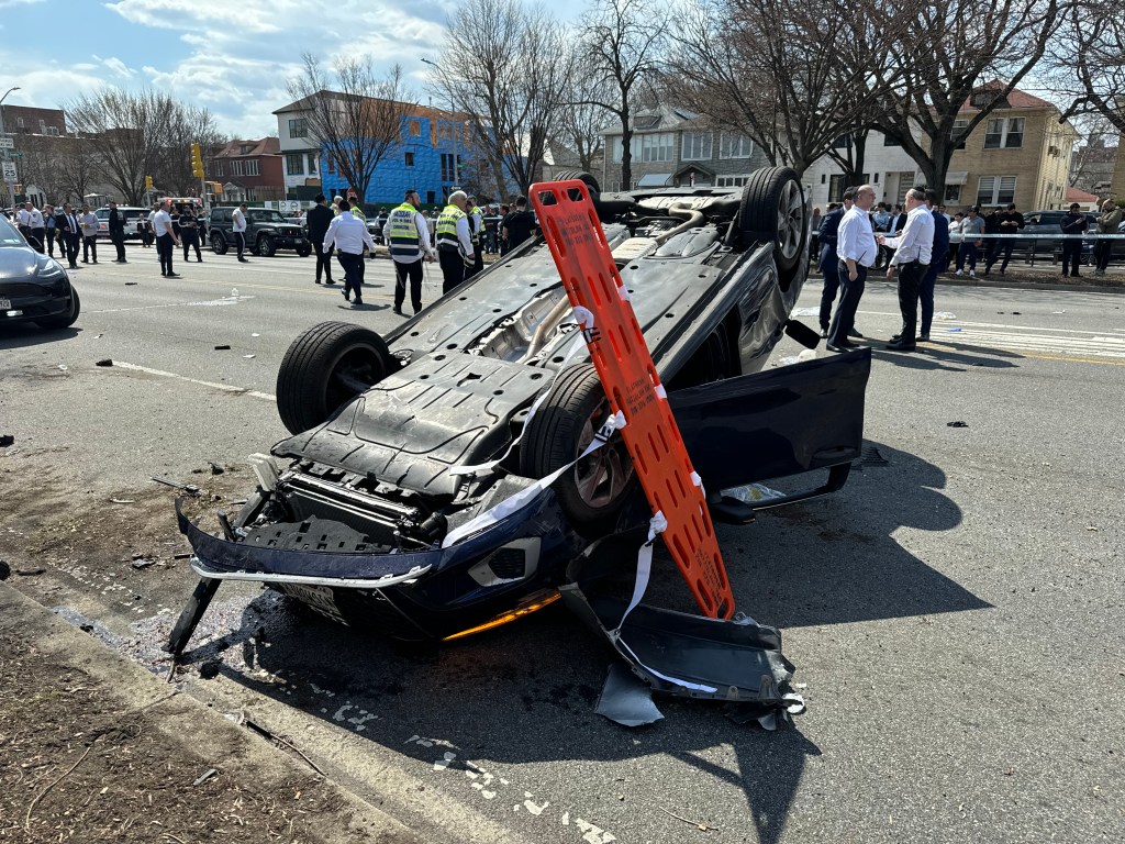 A photo of Miriam Yarimi's car that flipped and landed 150 feet away from the crash