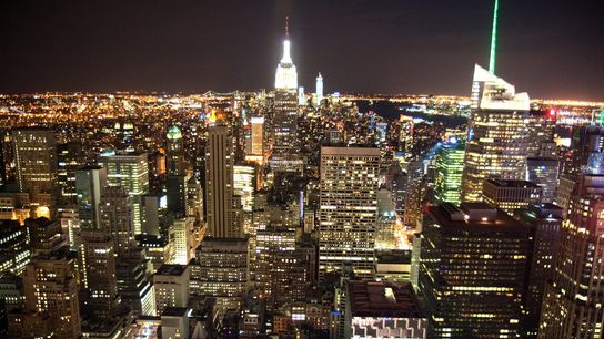 A view of Manhattan at night from the Top of the Rock observation deck at 30 Rockefeller Center in New York City 