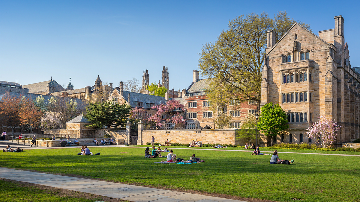 Students gather on the Yale University campus in New Haven, Connecticut. A Yale student is facing charges in an alleged New York City subway sexual assault case