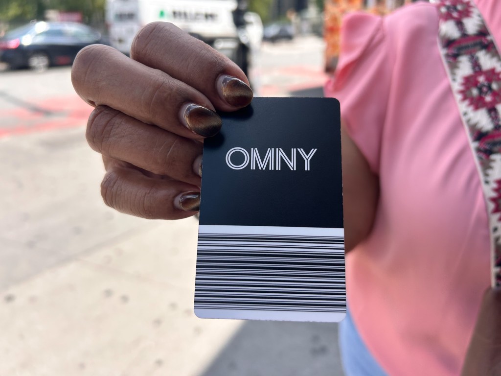 Bronx bus rider Nidia Santana said she still carries coins to pay for fares in case her senior OMNY card is not stocked with enough money,