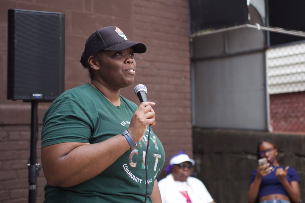Nanthale Collins speaks at an event for the East New York Community Land Trust,