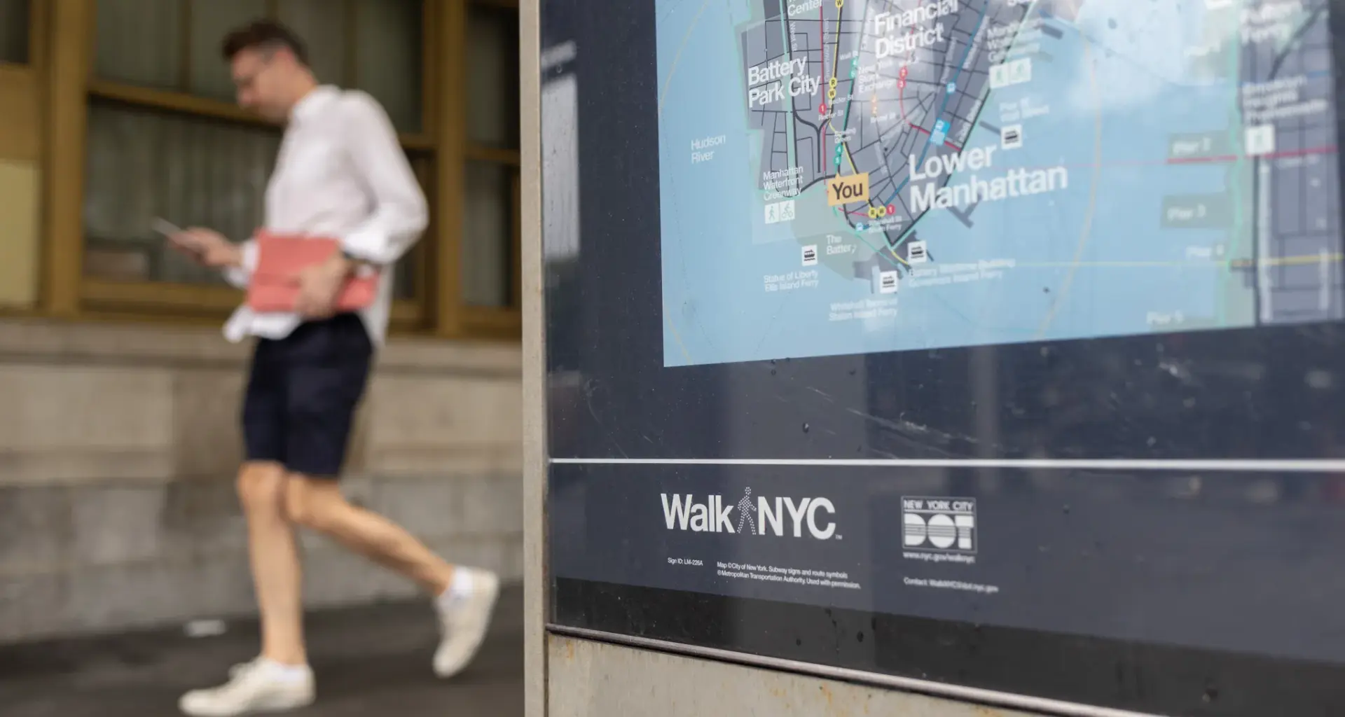 A Walk NYC kiosk provided pedestrians with a map of Lower Manhattan, Aug. 3, 2026. Credit: Ben Fractenberg/The City Reporter