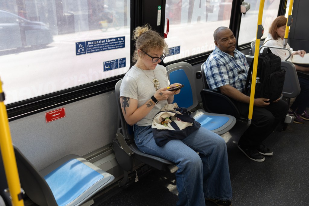 An M11 bus head down Ninth Avenue in Hell’s Kitchen had a fold-up seats section to fit strollers