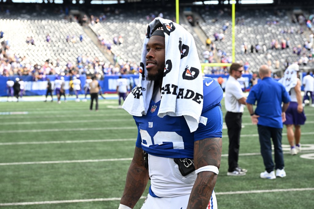 Giants running back Tyrone Tracy Jr. (29) walks off the field after a preseason game.