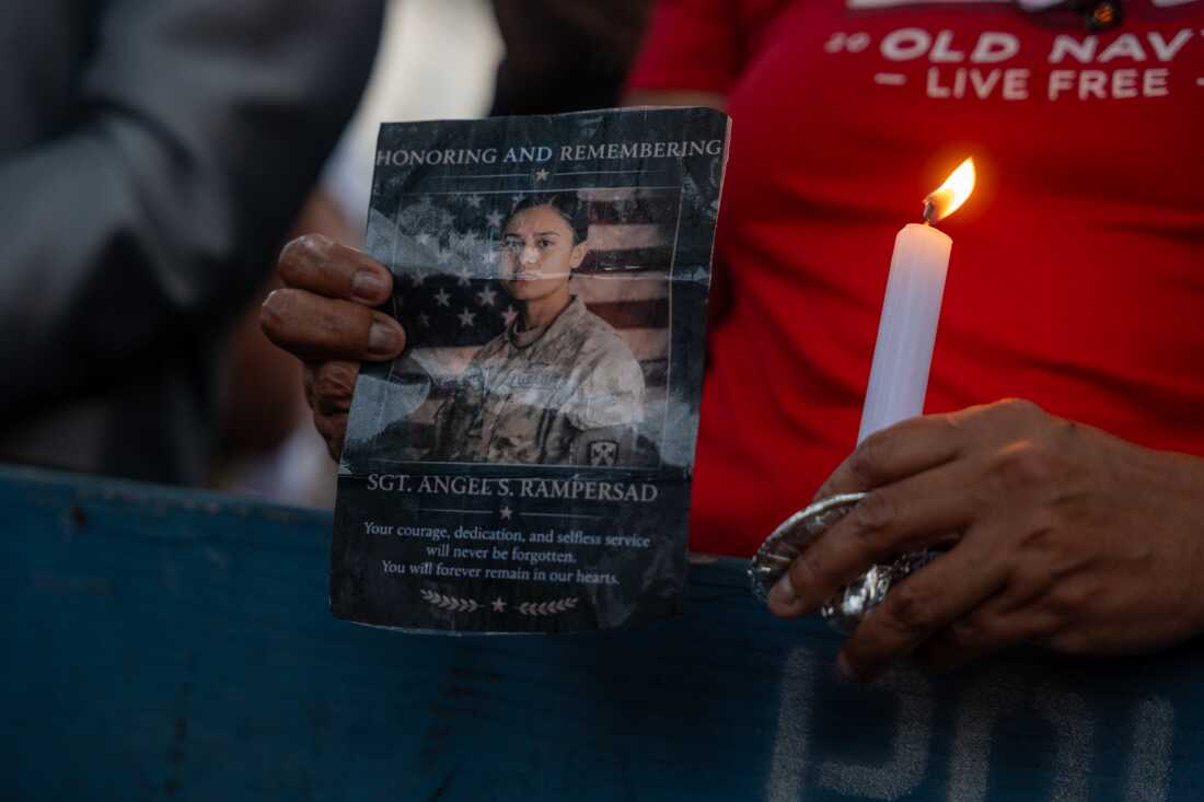 A candlelight vigil is held for Army Sgt. Angel Rampersad in front of her family's home on July 27, 2026 in the Ozone Park area of New York City. Rampersad was one of three American service members killed in action on July 17 at Muwaffaq Salti Air Base in Jordan. Her funeral is scheduled for Friday.