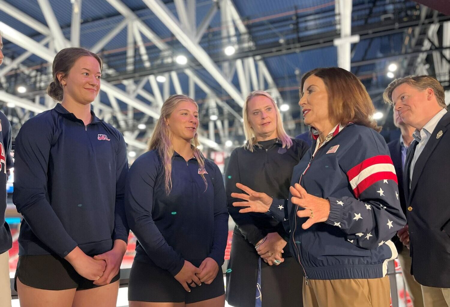 Governor Hochul spoke with some American hockey players, including Ava McNaughton, a goalie for the Olympic team that recently won gold in Milan. Photo: Emily Russell