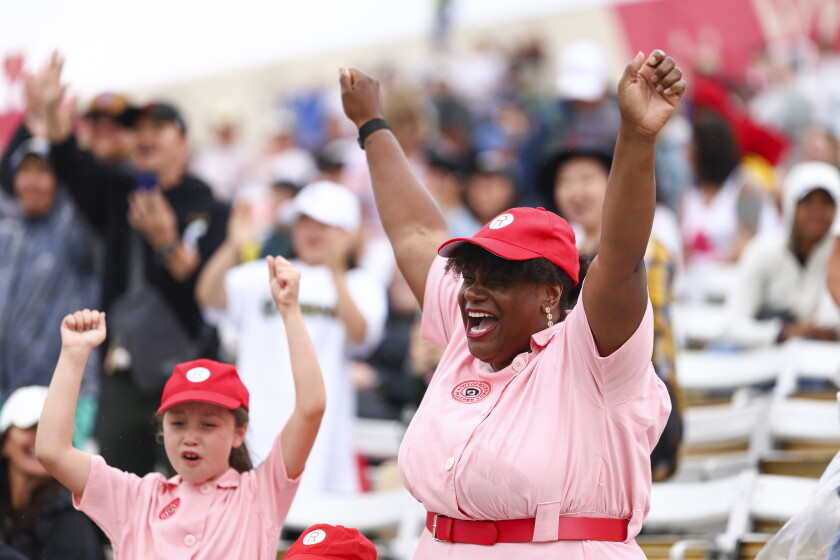 Fans cheer before the Women's Pro Baseball League Opening Day Game in Springfield.