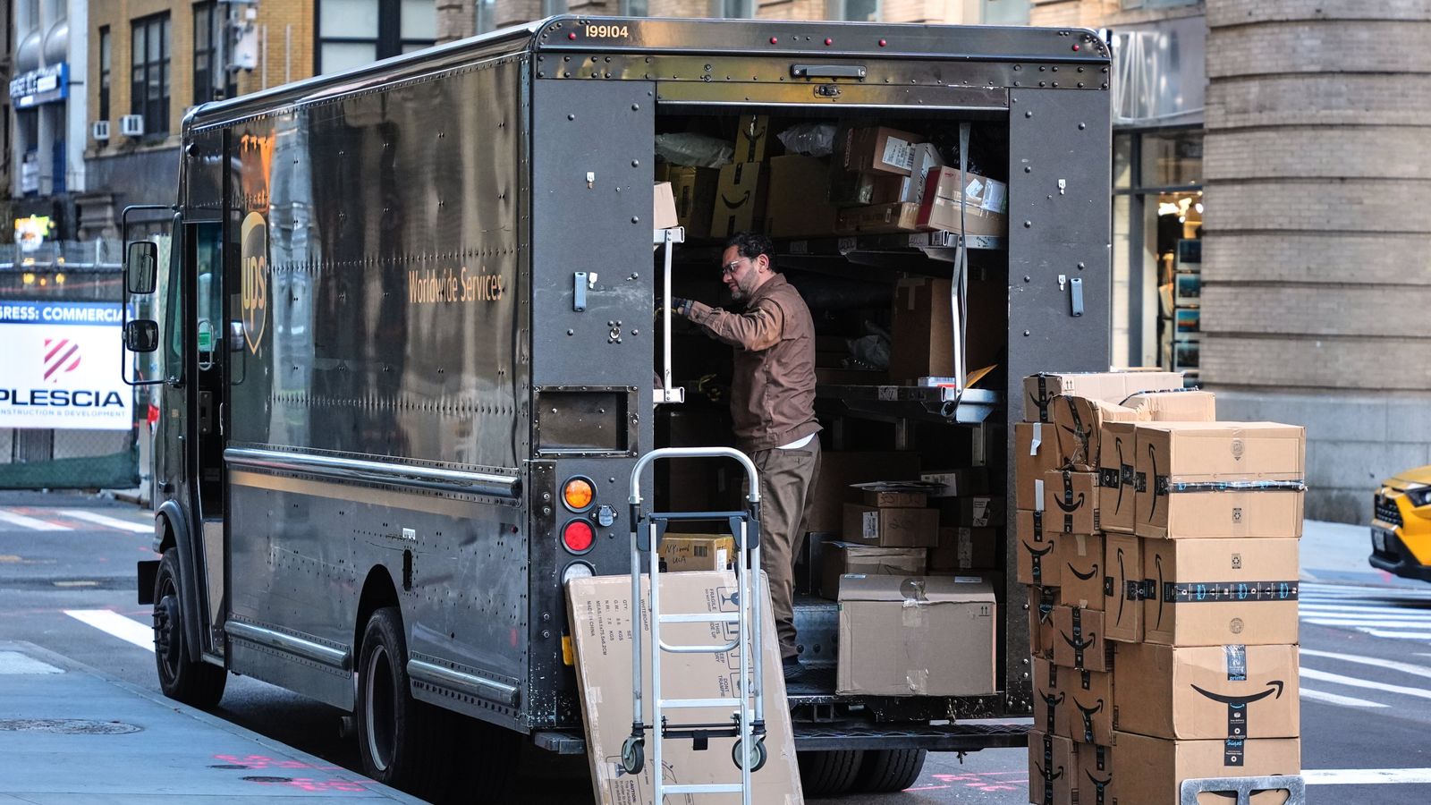 Manhattan UPS workers sleep in cafeteria, wander streets overnight under split-shift regime