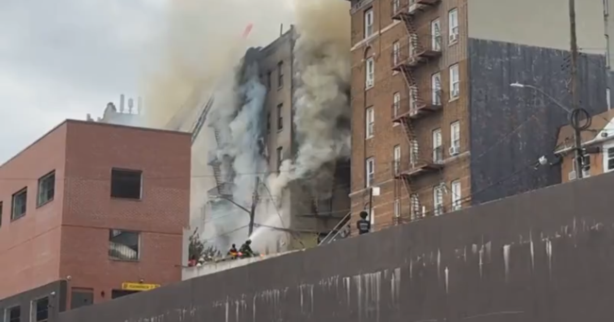 1 dead, 15 injured in 5-alarm Bronx fire; blaze continues to rage