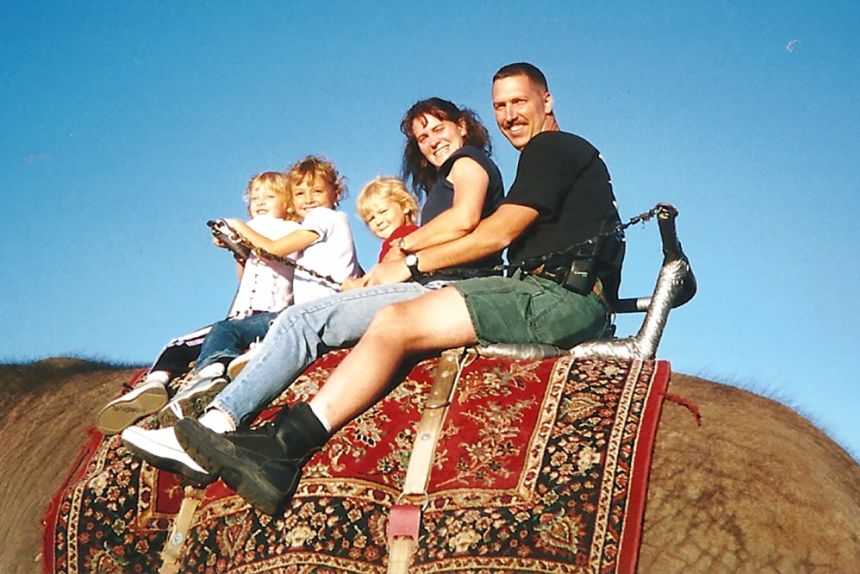 Douglas Miller, here with his young family, was one of the firefighters who went to help and never made it home.