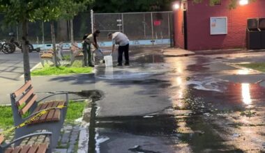 Cleanup crews on the scene after a 10-year-old girl was injured in a fireworks accident in a park.