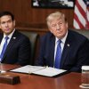 President Donald Trump, alongside US Secretary of State Marco Rubio (L), speaks during a Cabinet meeting at Camp David in Maryland, on July 31, 2026.