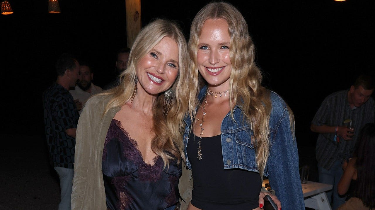 Christie Brinkley and Sailor Brinkley Cook twin at John Mayer event