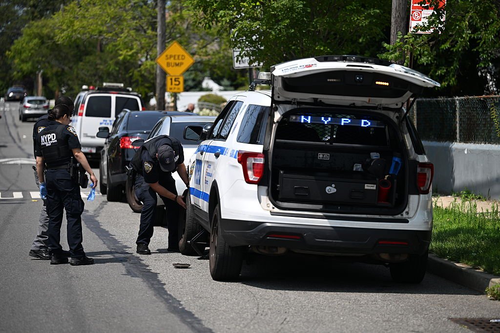 Police shoot armed suspect in Queens after house fire