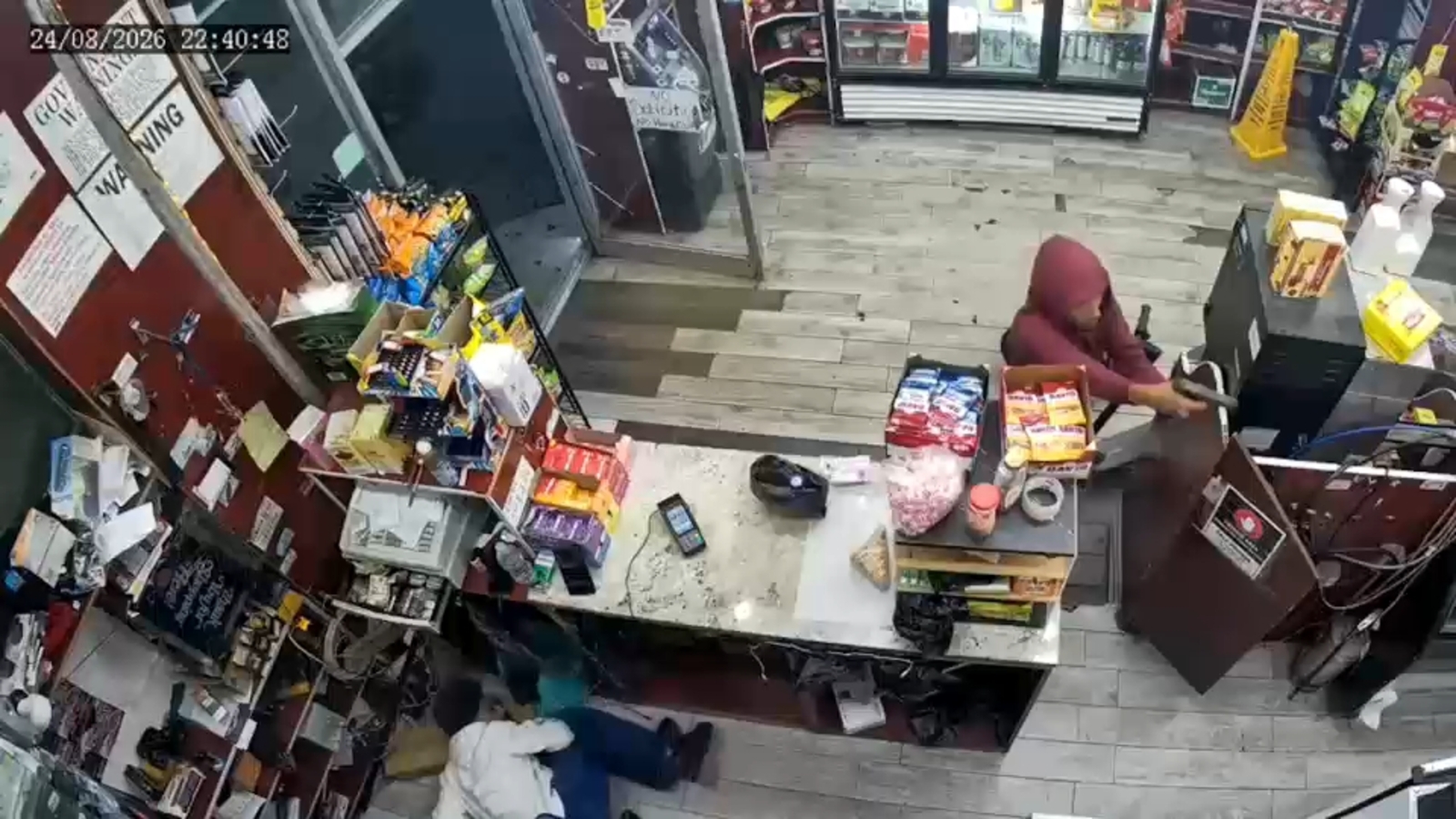 Caught on camera: Gunman shoots customer before robbing store on East 149th Street in the Bronx
