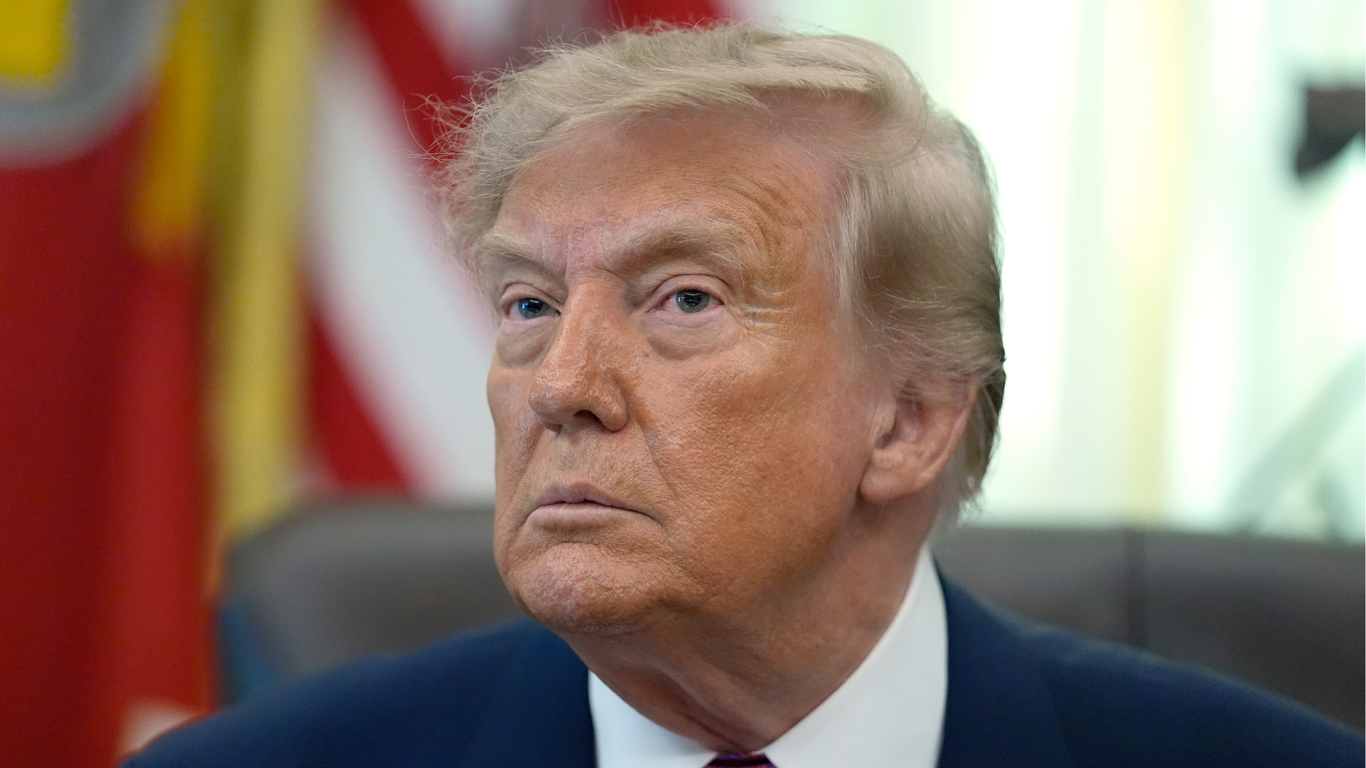 President Donald Trump listens to a question from a reporter in the Oval Office of the White House, Thursday, Aug. 27, 2026, in Washington.