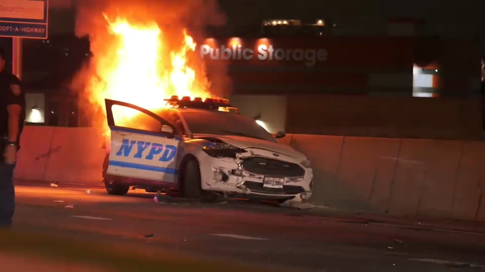 Driver rear-ends NYPD cruiser, causing it to overturn and catch fire on Bruckner Expressway in Bronx