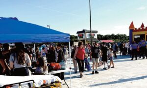 Crowds at 111th Precinct National Night Out. Photo Catherine Tsounis