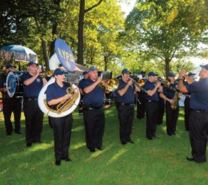 The NYPD marching band played the national anthem and other familiar tunes.