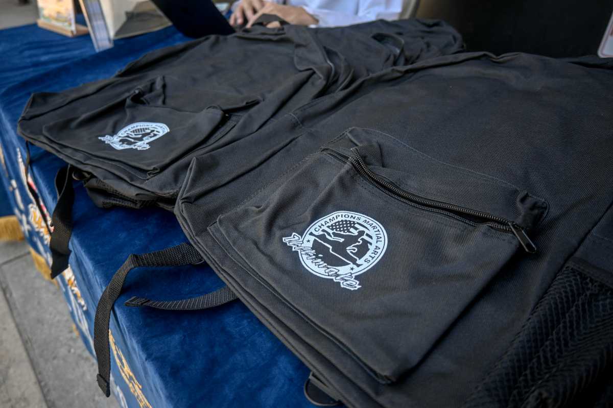 Champion Martial Arts hosts backpack giveaways in Flushing – QNS