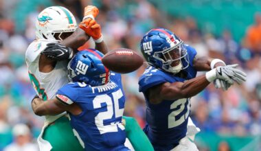Aug 22, 2026; Miami Gardens, Florida, USA; New York Giants safety Tyler Nubin (27) and safety Jason Pinnock (25) defend against Miami Dolphins wide receiver Kevin Coleman Jr. (83) during the first half at Hard Rock Stadium.
