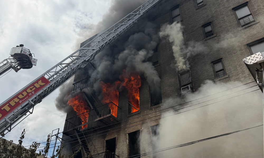 1 dead, 14 injured after explosion and fire at Bronx apartment building