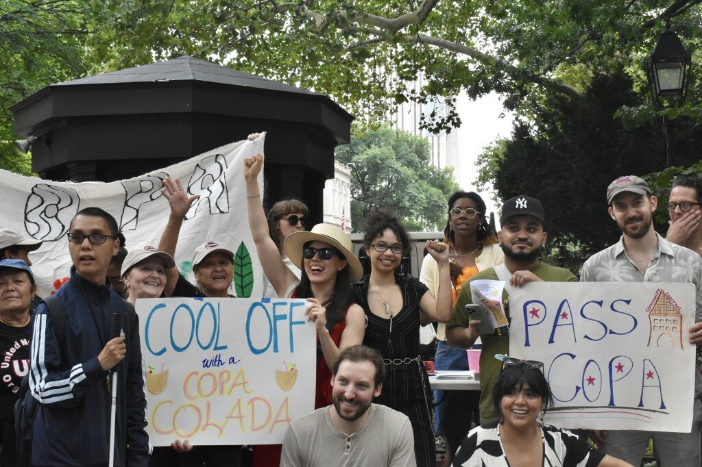 Advocates bore signs that read &ldquo;Pass COPA&rdquo; and &ldquo;Cool off with a COPA Colada.&rdquo;