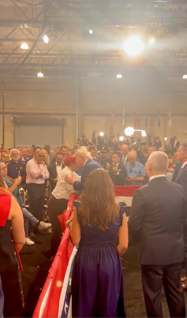 President Trump embracing Migdalia Martinez and retired NYPD Sergeant Jesus Freytes, whose son Jacob was tragically killed.