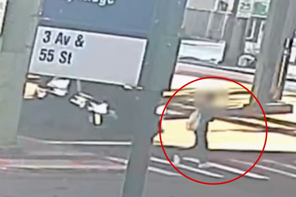 Surveillance image of the street corner where a 28-year-old nurse was fatally struck by a Cadillac, with a red circle highlighting the location of the incident.