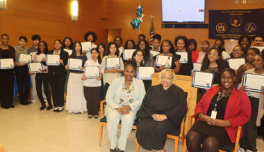Nicole Smith, Hon. Deborah Dowling and Jennifer Joly alongside 2026 interns holding their certificates. Photo: Mario Belluomo/Brooklyn Eagle