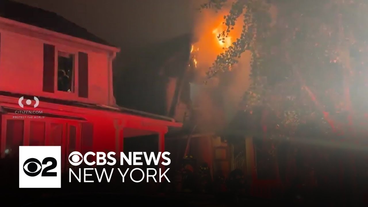 Large fire engulfs Queens house, spreads to neighboring homes
