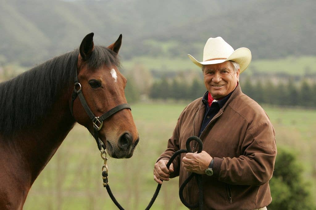 Author and Horse Trainer Monty Roberts with horse Shy Boy at his ranch on March 17, 2005 in Buellton, California. 