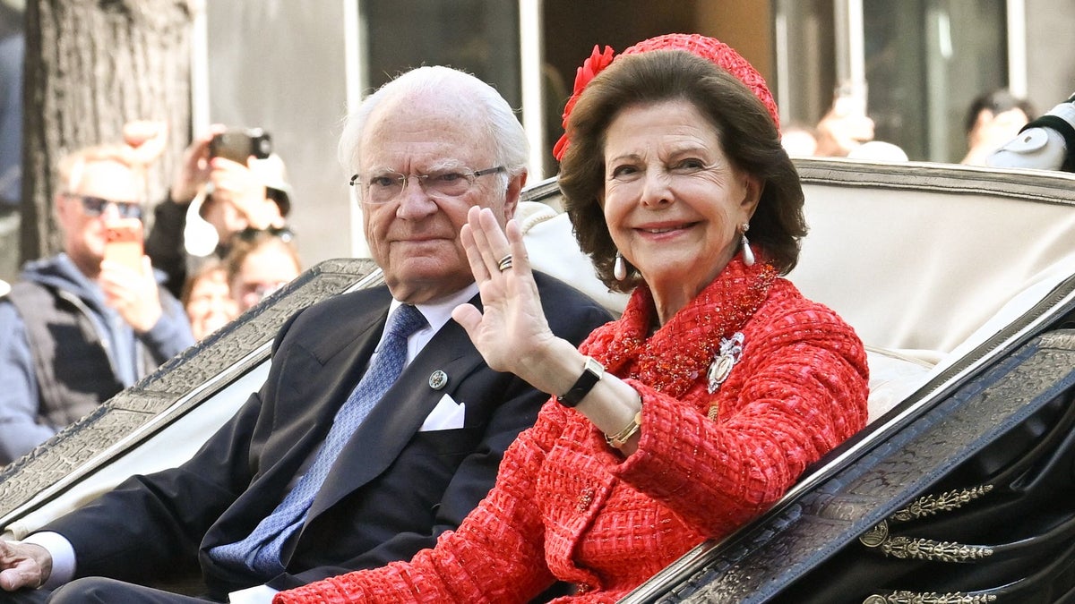 Queen Silvia of Sweden, 82, climbs a firefighting plane battling Belgium's worst wildfire on record