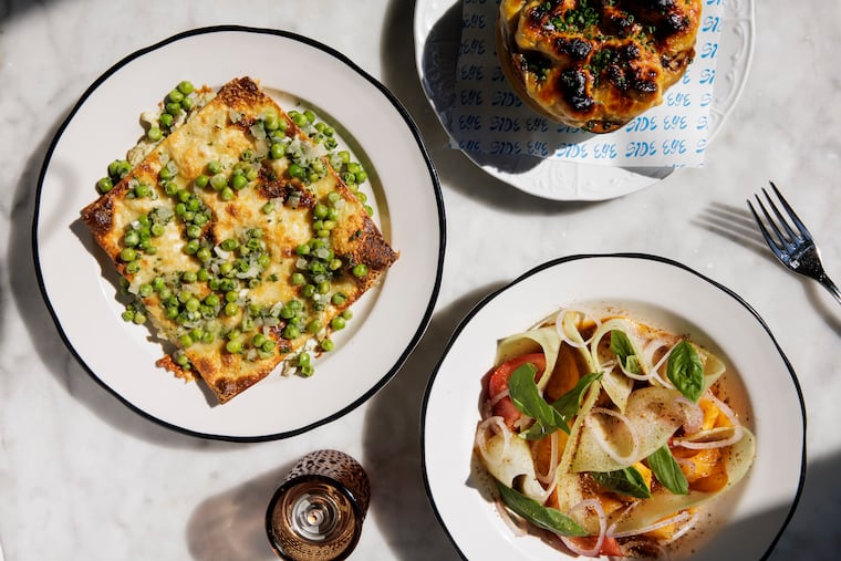 The lasagna, French onion soup, and tomato and honeydew salad at Side Eye on Thursday, July 23, 2026 in Philadelphia.