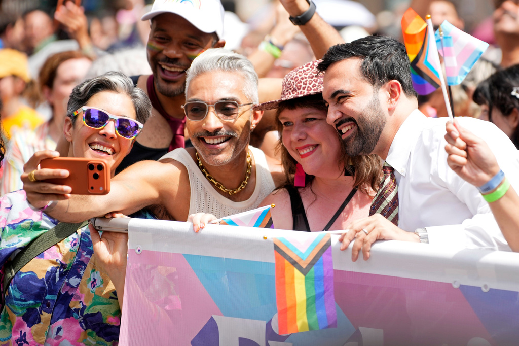 New York Mayor Zohran Mamdani, right, takes a photo with fans during the 57th annual NYC Pride March on Sunday, June 28, 2026, in New York.