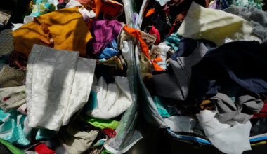 Fabric pieces sit for sale in bins at the Brooklyn Creative Reuse, Wednesday, July 29, 2026, in Brooklyn borough of New York. (AP Photo/Alyssa Goodman)