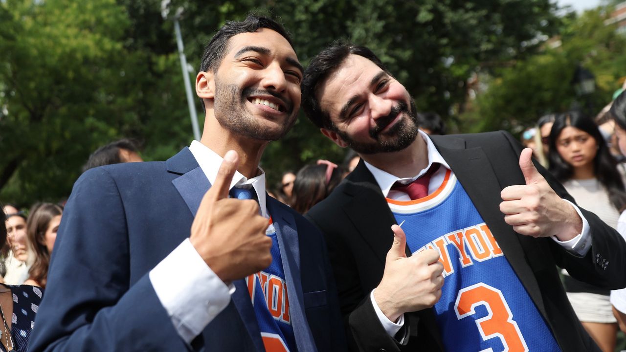 Participants pose for photos during a Zohran Mamdani look-alike contest, Sunday, Aug. 30, 2026, in New York.