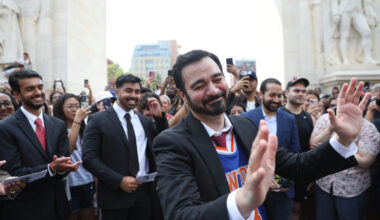 Amadeo Fusca, winner of the Zohran Mamdani look-alike contest, reacts with the crowd, Sunday, Aug. 30, 2026, in New York. (AP Photo/Heather Khalifa)