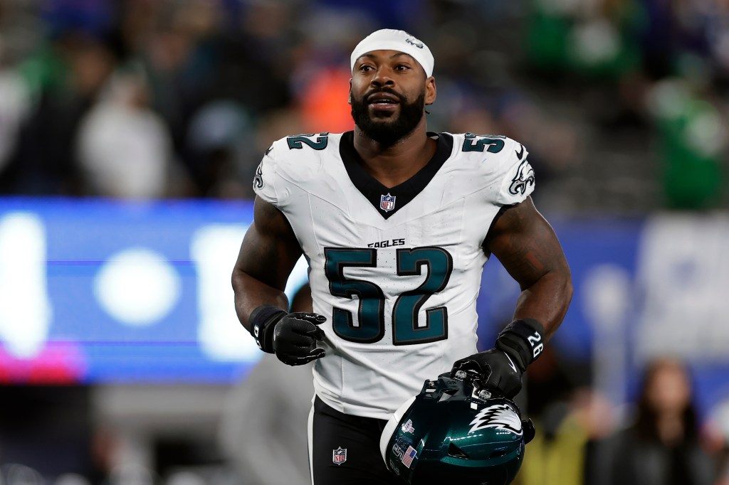 Philadelphia Eagles outside linebacker Za'Darius Smith (52) runs off the field after an NFL football game against the New York Giants, Oct. 9, 2025, in East Rutherford, N.J.